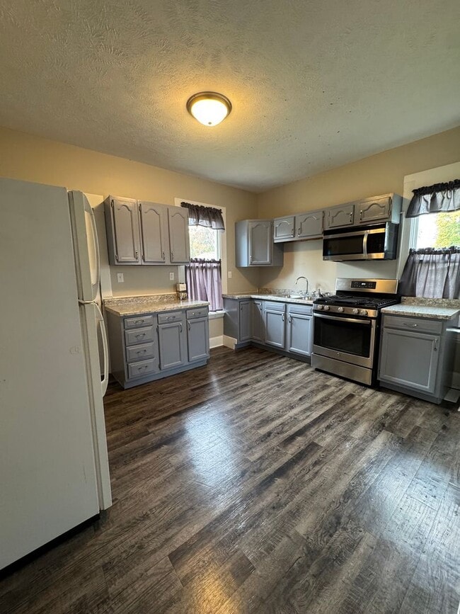 Photo - Charming 3-Bedroom Home with Den on Spacio...