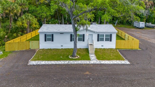 Building Photo - Experience exceptional living at its finest Rental