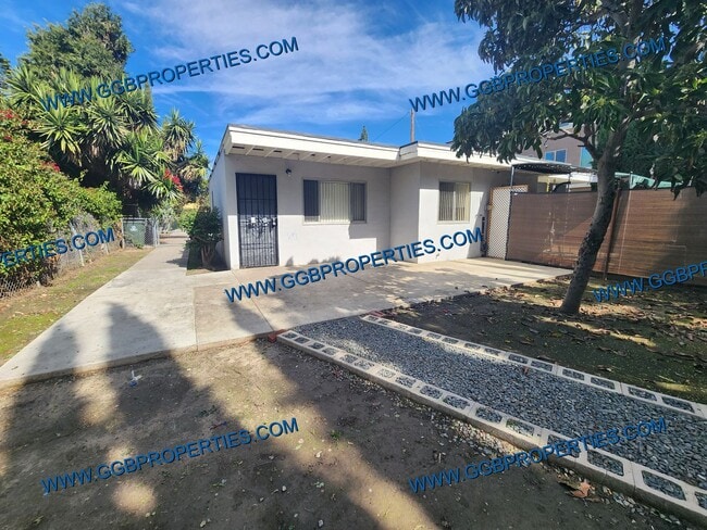 Building Photo - 10872 Stanford Ave Unit 10872  1/2