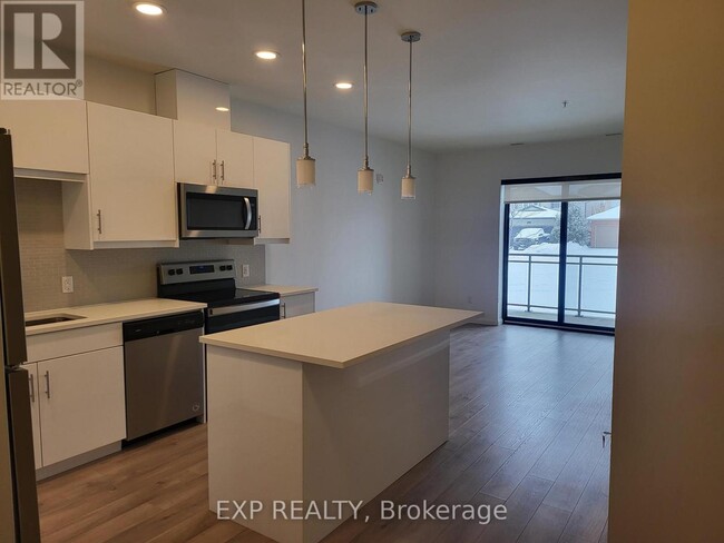 Photo - 144 Watson Rd N Unité 607