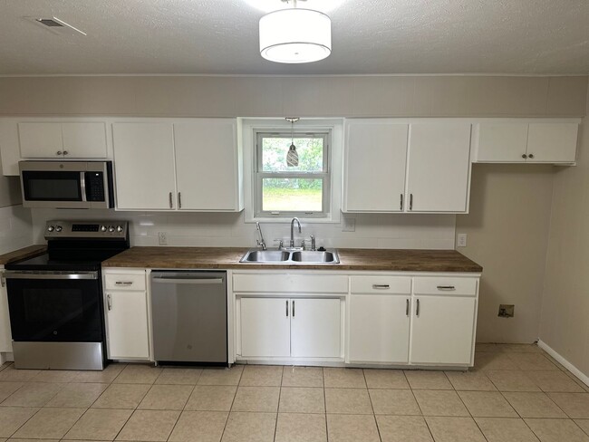 Photo - Available July 1st! 4-Bedroom, 1-Full Bathroom Home in Convenient Springdale Location