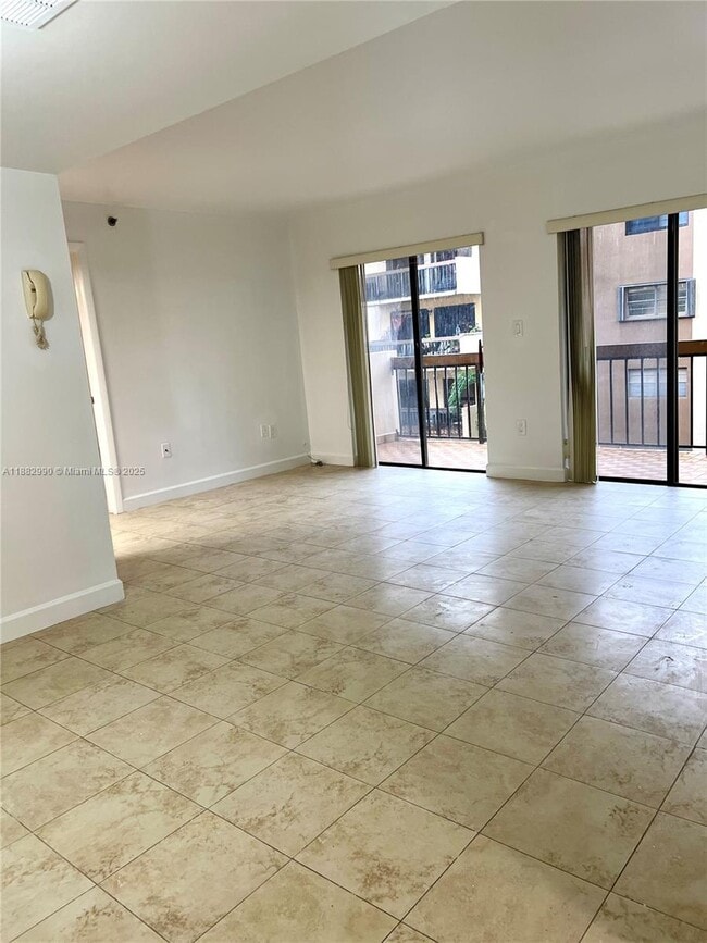 Building Photo - 5249 NW 7th St Unit 303