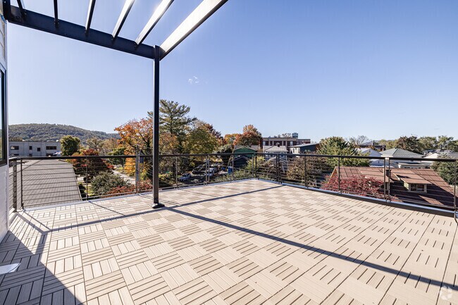 2 habitaciones, 2 baños - 1020 pies cuadrados - Terraza en la azotea - Belmont Heights Apartments