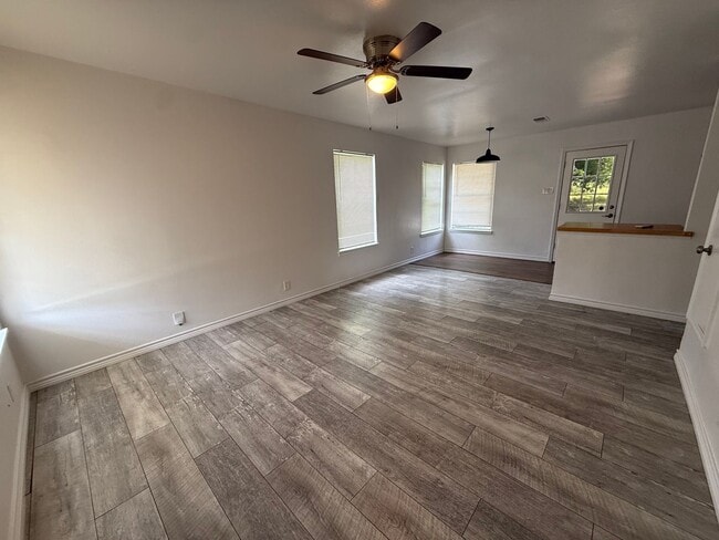 Photo - Charming 3-Bedroom Home with Hardwood Floors & Spacious Backyard