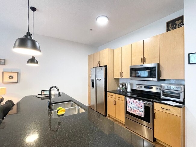 Photo - Luxury Condo Living in the Heart of Excelsior & Grand -Available NOW!