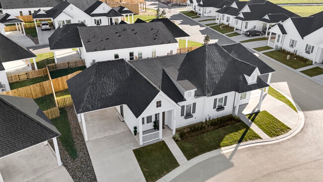 GORGOUES ARIAL VIEW of COTTAGES! ALL WITH PRIVATE COVERED PULL-UP DRIVEWA