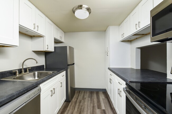 Renovated Kitchen with Stainless Steel Appliances - Stonecliffe