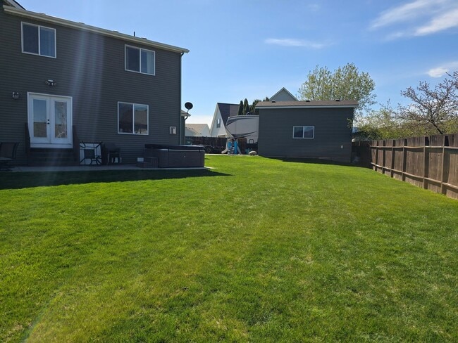 Photo - Beautiful 5 bedroom 2.5 bath home with 3 car garage and an additional Custom Shop in Post Falls!