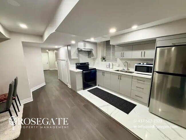 Photo - All-Inclusive 2-Bedroom Basement Apartment with In-Unit Laundry – Brampton Unit 2