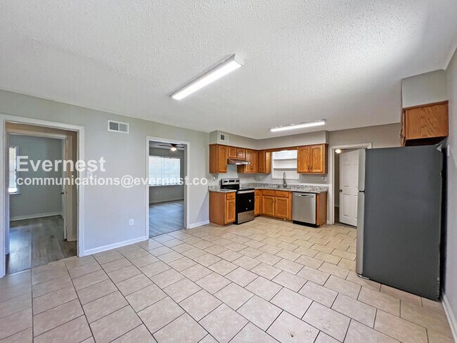 Photo - 4 Bed, 1.5 Bath Home with Fenced Yard / Pet-Friendly / Coming Soon!