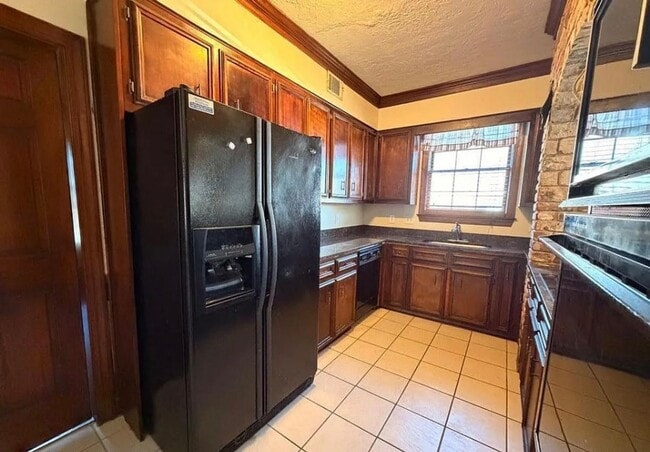 Photo - Spacious 4BR Home in Sought-After Springlakes – Balcony, Patio & Amenities!