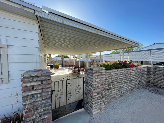 Building Photo - Partially Furnished Manufactured Home on its own Large Corner Lot! *No HOA*