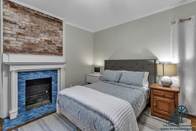 Photo - Furnished 4-Bedroom, 2.5-Bath Apartment near Elmwood Village Unit 1