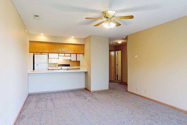 Open living areas connected to the kitchen create an inviting space where everyday meals, conversations, and downtime naturally come together.