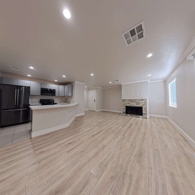 Building Photo - Highly Remodeled | Customer Closets | Gated Community