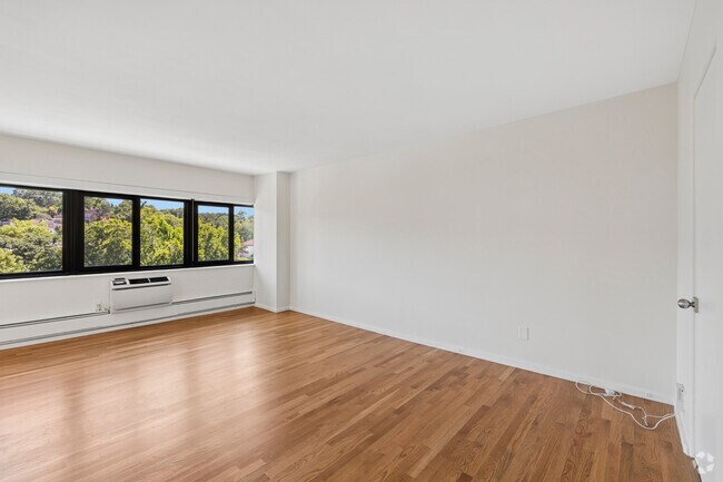Premium - 2BR, 1BA - 965SF - Living Room - The Sunset Apartments