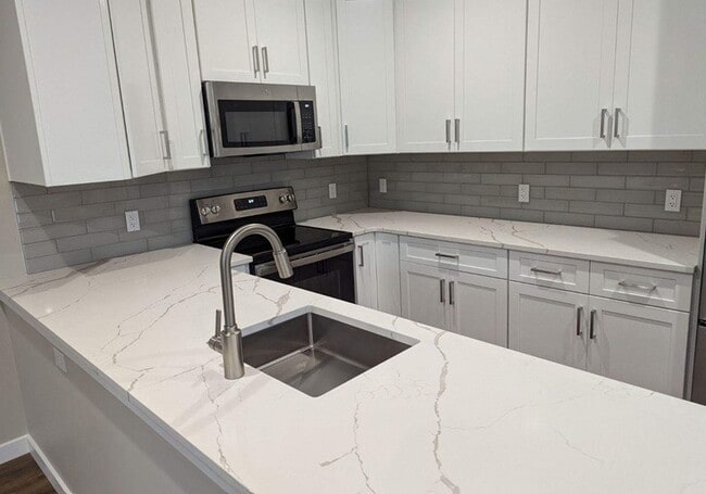 White Stone Counters Featured in Apartments #102, #104, & #106