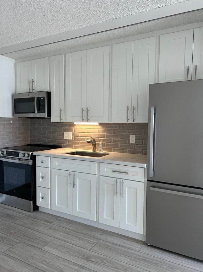 Kitchen w/new - 1655 Makaloa St Unit 1814