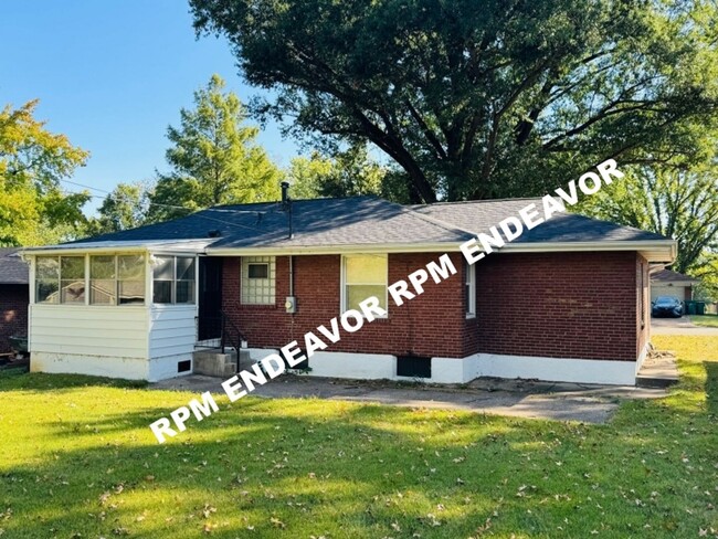 Photo - "Charming 4-Bedroom Haven with Sunroom, Ha...