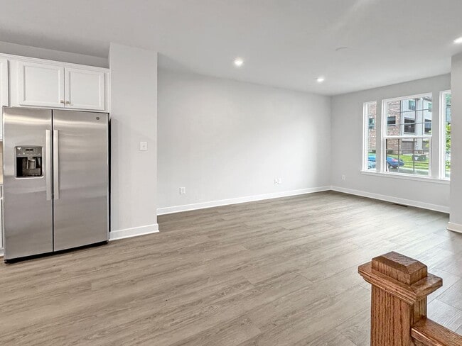 Photo - Spacious 3-Bedroom Townhome with Finished ...