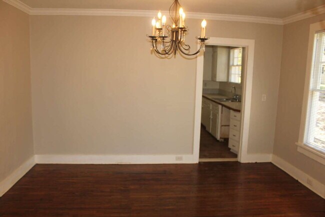 Photo - Cute cottage located in Midtown. Large front porch with a swing for cool evenings. Home is freshl...