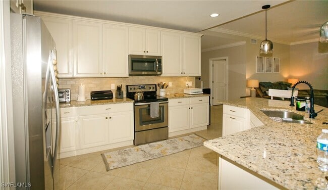 Building Photo - 11761 Grand Belvedere Way Unit 102 Rental