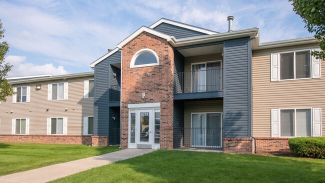 Stylish two-story buildings feature attractive brick archway entrances and contemporary design, professionally operated by Highlands Vista Group.