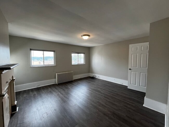 Photo - Renovated 2BD/1BATH House - Off-Street Parking, Laundry, AC