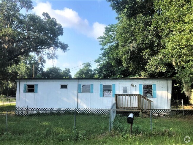 Building Photo - Dade City 2BR Mobile Home! Gorgeous Floors...