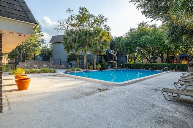 Enjoy a relaxing day by the pool in this tranquil setting ideal for leisure and comfort.