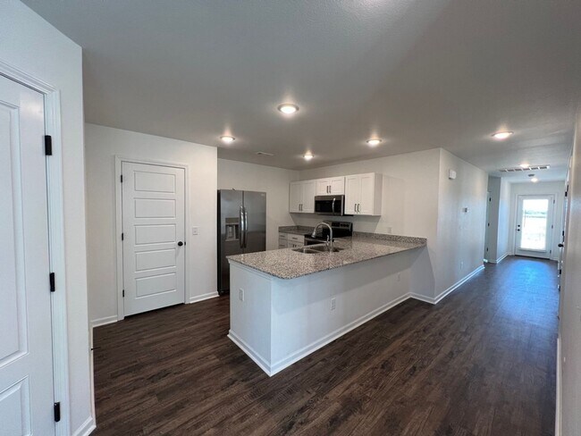 Photo - New 3 Bedroom Townhome ($999 Per Month)