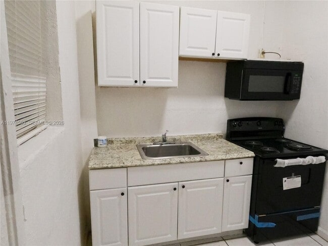 Photo - 1120 NW 64th St Unit B Side