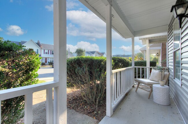 Photo - Discover this beautifully updated Raintree townhome featuring an open floor plan and a range of c...