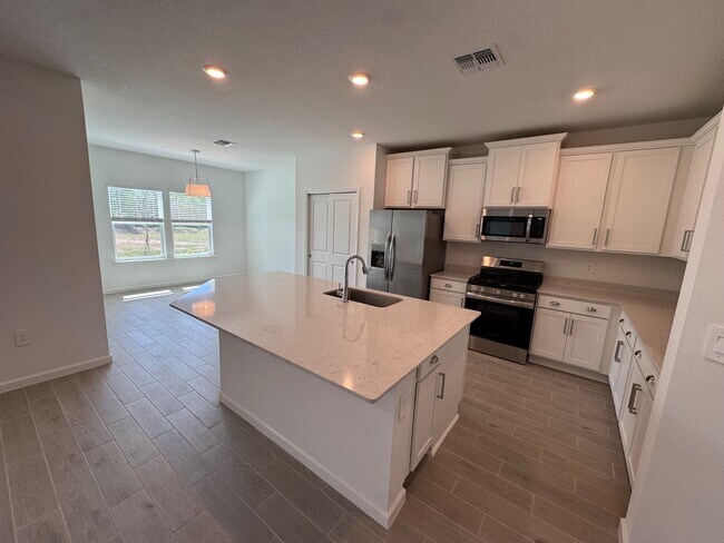 Photo - 13717 NW Convergence Blvd