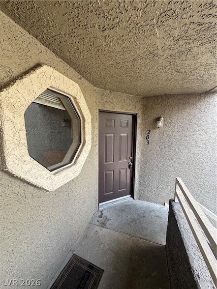 Building Photo - 5050 S Rainbow Blvd Unit 203