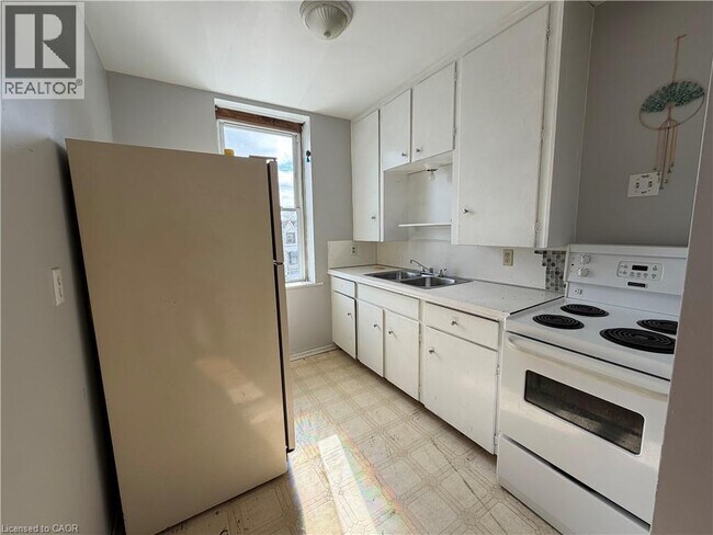 Photo - 571 Ontario St Unité 2