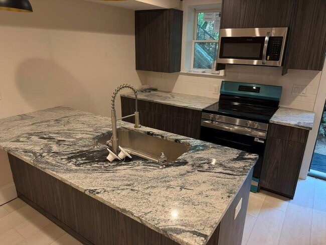 Building Photo - 83 26th St NW Unit 3