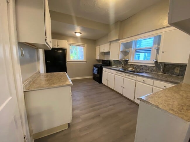 Photo - Updated 4-Bed with Porch & 2-Car Garage on...