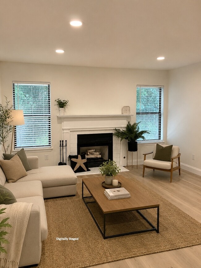 Livingroom with hardwood floors and gas fireplace - 2206 Huntingdon Chase Unit 2206