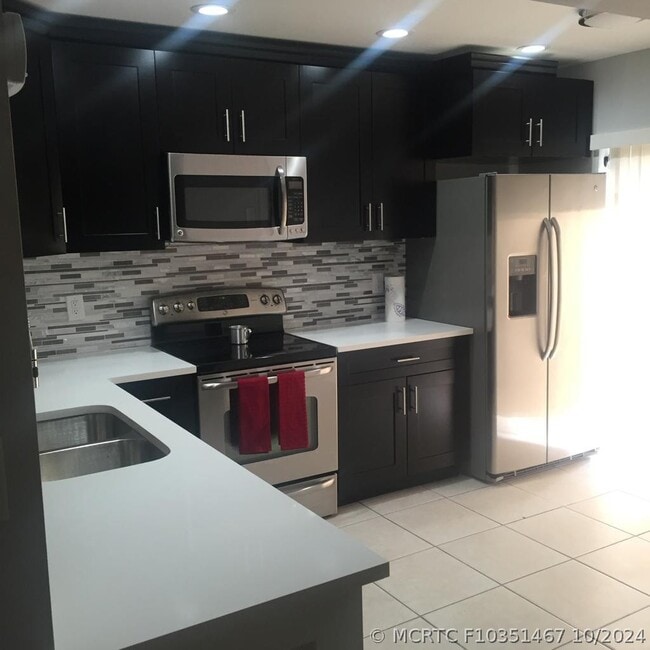 Photo - 3343 Carambola Cir S Unit 3343