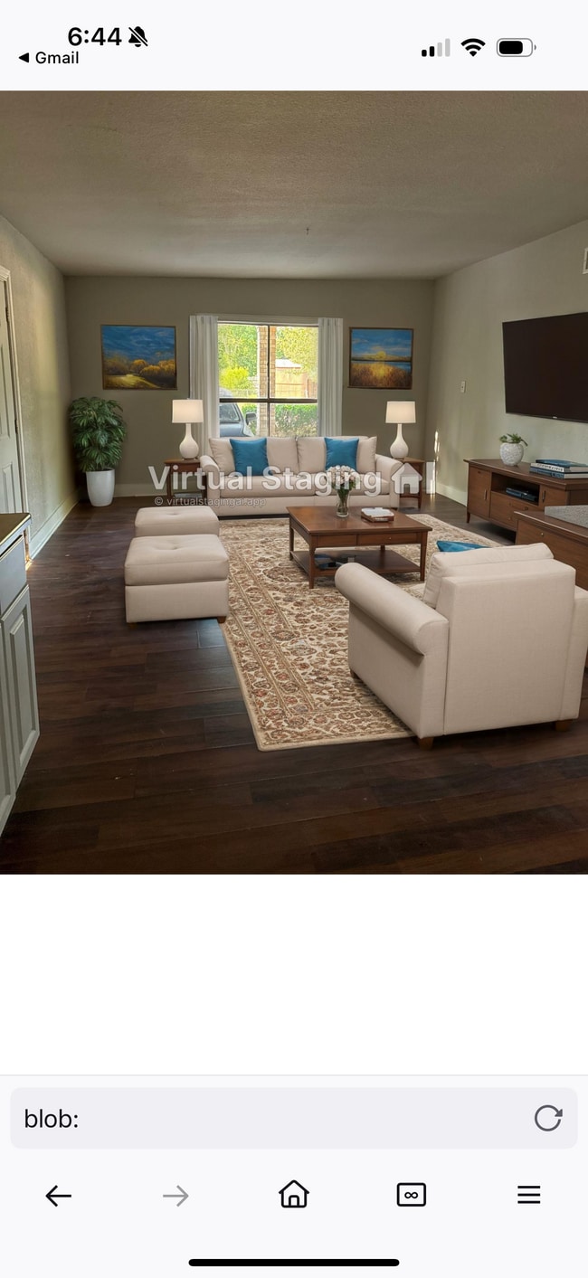Living room with virtual furniture - 5622 Castle Prince Apartments