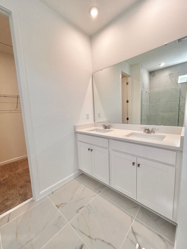 Photo - Thoughtfully Designed 4/3 Home with Premium Upgrades and 2 Car Garage! Available Now!