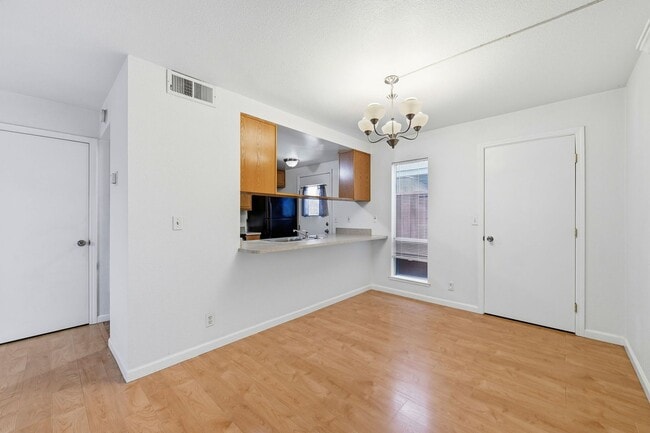 Photo - Spacious 2BD/1.5BA Fremont Townhouse | In-Unit W/D | Community Pool & Hot Tub | Carport Parking