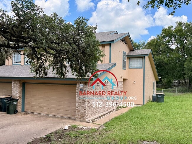 Building Photo - Available July 11: 3 bedroom, 2.5 Bath Duplex with Garage and Fenced Yard