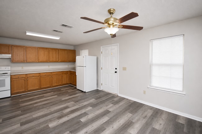 Photo - 3BR Cottage-Style Home in Milton with LVP Flooring, Partially Fenced Yard & Convenient Location N...