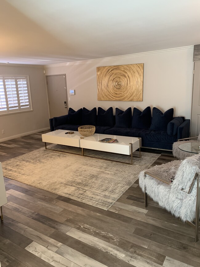 living room (view from kitchen) - 1128 11th St Condo Unit 105