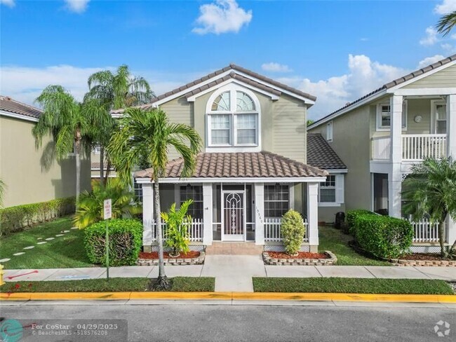 Building Photo - 10569 NW 56th Pl Rental