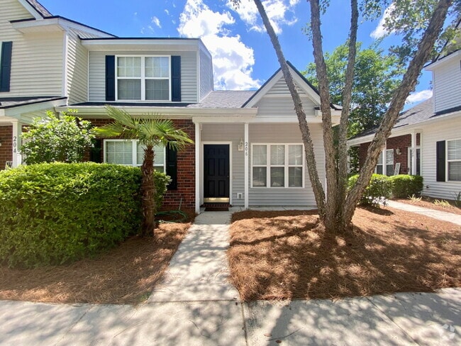 Building Photo - Spacious Townhome located in The Townes at...