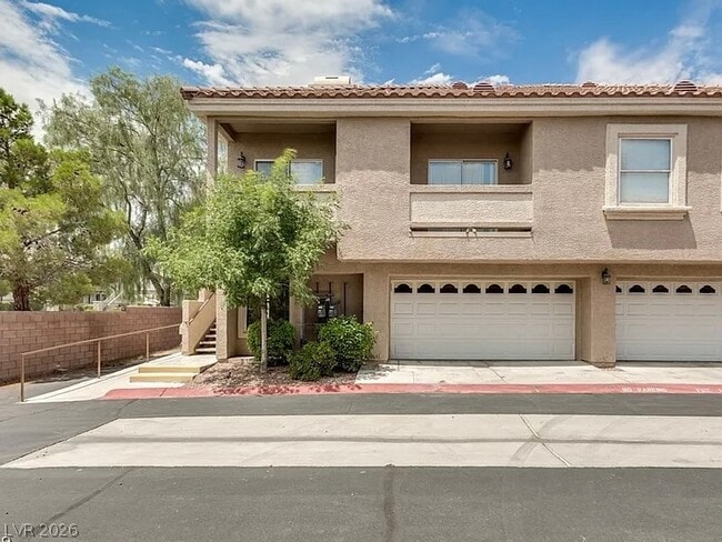 Building Photo - 5125 W Reno Ave Unit 1055