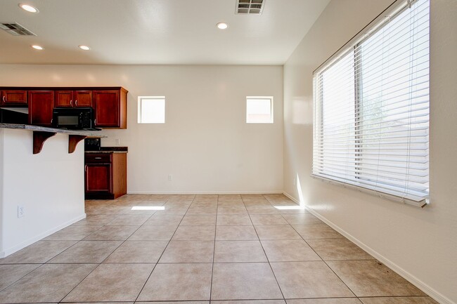 Photo - 4 Bedroom in Tolleson.  Landscaping redone.  Newer Carpet, Available February 1st!!!  Great 2 sto...